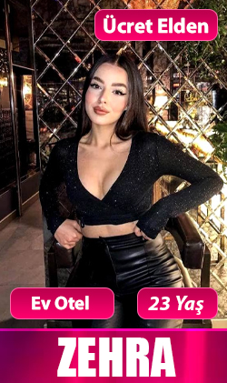 İzmir escort bayan, yeşil elbise ile bahçe ortamında zarif duruş
