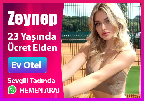 Genç esmer kadın ev ortamında rahat gülümseme, İzmir escort profili